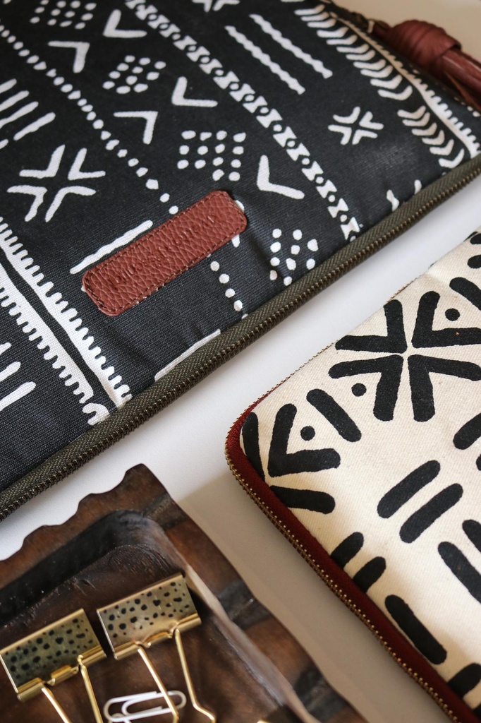 13_-14_Laptop_Sleeve_-_Ikwetta_x_This_Is_Essential_Black_1_dcbd4976-9200-4d65-b710-5315fb4d0fda.jpg